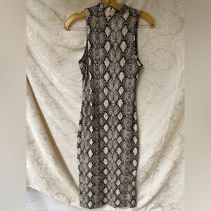 Caution to the Wind Mock neck midi Dress in python print